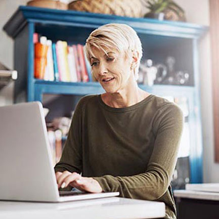A person using a laptop to find same day care options